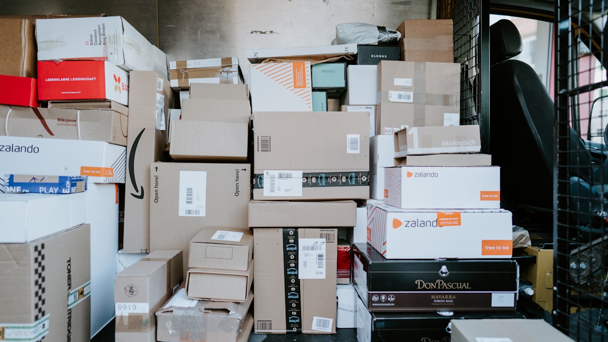 Delivery van loaded with parcels and boxes ready for drop-off