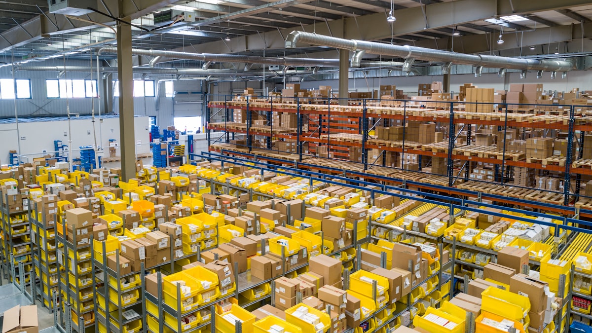 Warehouse with shelving and bins full of goods to be counted