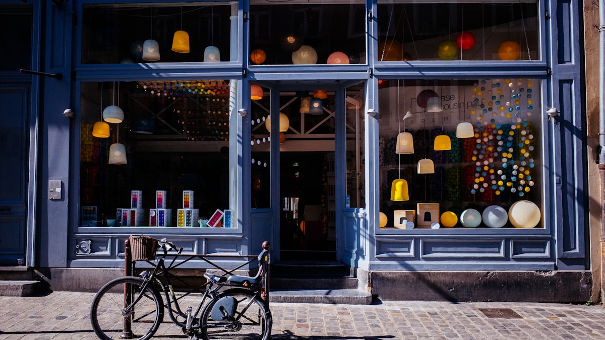 Shop window and front door of a store on the street