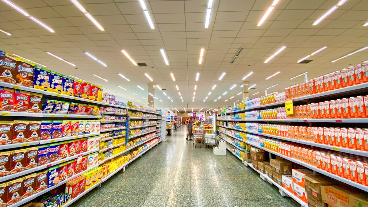 Nearly empty supermarket aisle during a quiet trading hour